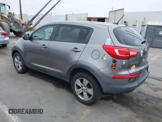 2013 Kia Sportage LX with VIN KNDPBCA23D7529658, listed as a IAAI auction lot 42473877 with 114,797 mi miles and . Bid and sale history available at DreamBid. Image 3.
