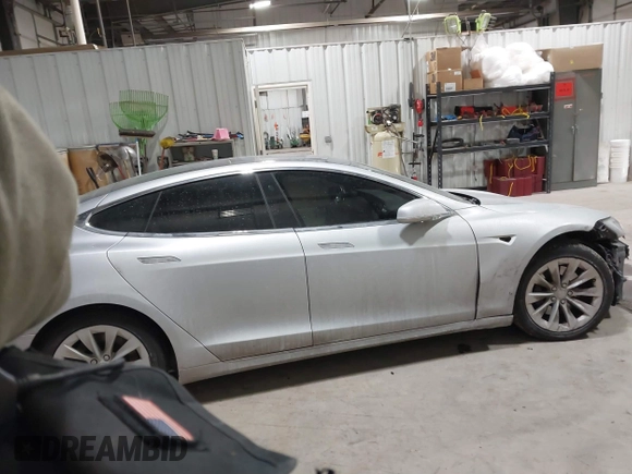 2017 Tesla Model S 100D with VIN 5YJSA1E23HF232059, listed as a IAAI auction lot 41394046 with 84,052 mi miles and . Bid and sale history available at DreamBid. Image 14.