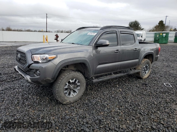 2018 Toyota Tacoma SR with VIN 3TMCZ5AN5JM132681, listed as a Copart auction lot 43244765 with 99,881 mi miles and Salvage Title. Bid and sale history available at carsss.com. Image 1.