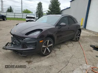 2023 Porsche Macan z VIN WP1AA2A52PLB05640, wystawiony jako Copart lot #57168305 z przebiegiem 11 928 mil mil oraz Nie do naprawy • Non repairable. Historia ofert i sprzedaży dostępna na DreamBid. Obrazek 1.