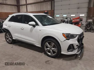 2021 Audi Q3 S line Premium z VIN WA1DECF3XM1118170, wystawiony jako IAAI lot #42264258 z przebiegiem 79 940 mil mil oraz . Historia ofert i sprzedaży dostępna na DreamBid. Obrazek 1.