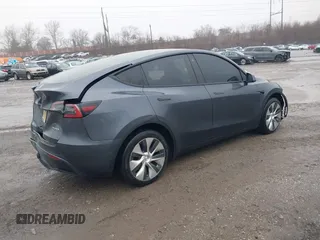 2022 Tesla Model Y Long Range z VIN 7SAYGDEE9NF331410, wystawiony jako IAAI lot #41580172 z przebiegiem 81 794 mil mil oraz . Historia ofert i sprzedaży dostępna na DreamBid. Obrazek 4.