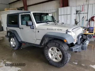 2007 Jeep Wrangler Rubicon z VIN 1J8GA64117L187431, wystawiony jako Copart lot #61293624 z przebiegiem 263 459 mil mil oraz Szkoda całkowita • Salvage title. Historia ofert i sprzedaży dostępna na DreamBid. Obrazek 4.
