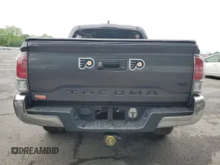 2021 Toyota Tacoma SR z VIN 3TYCZ5ANXMT050566, wystawiony jako Copart lot #57315615 z przebiegiem Nie podano mil oraz Szkoda całkowita • Salvage title. Historia ofert i sprzedaży dostępna na DreamBid. Obrazek 6.