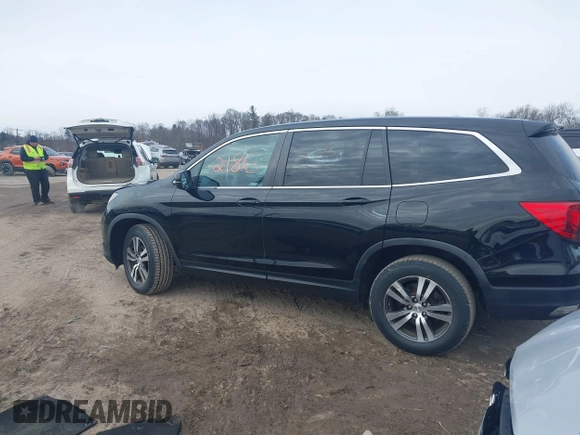 2017 Honda Pilot EX with VIN 5FNYF6H35HB089810, listed as a IAAI auction lot 41612186 with 116,489 mi miles and . Bid and sale history available at DreamBid. Image 14.