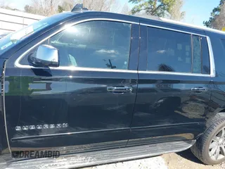 2019 Chevrolet Suburban LT with VIN 1GNSCJKC5KR360318, listed as a IAAI auction lot 41504344 with 82,997 mi miles and . Bid and sale history available at DreamBid. Image 14.