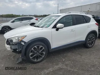 2016 Mazda CX-5 Grand Touring with VIN JM3KE4DY9G0689491, listed as a Copart auction lot 52718395 with 123,090 mi miles and Salvage Title. Bid and sale history available at carsss.com. Image 1.
