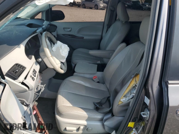 2013 Toyota Sienna XLE AAS with VIN 5TDYK3DC1DS345298, listed as a Copart auction lot 58750235 with Not provided miles and Salvage title. Bid and sale history available at DreamBid. Image 7.