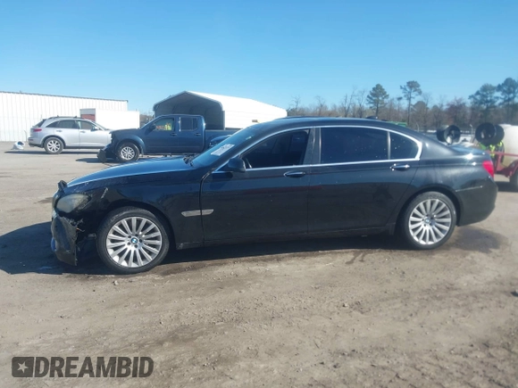 2011 BMW 7 Series 750Li xDrive with VIN WBAKC8C53BC433865, listed as a IAAI auction lot 41823357 with 122,476 mi miles. Bid and sale history available at carsss.com. Image 14.