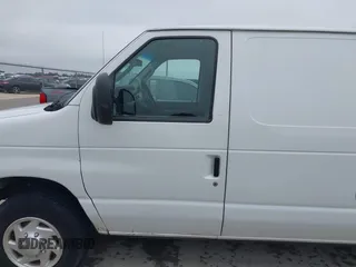2014 Ford Econoline Cargo Commercial z VIN 1FTNE2EW7EDA00870, wystawiony jako IAAI lot #42384856 z przebiegiem 156 312 mil mil oraz . Historia ofert i sprzedaży dostępna na DreamBid. Obrazek 14.