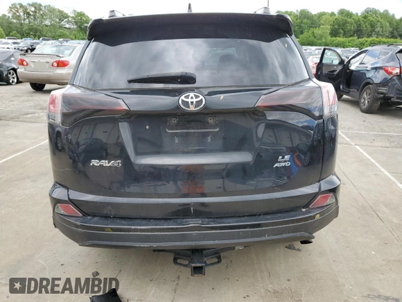 2018 Toyota RAV4 LE z VIN 2T3BFREV1JW739200, wystawiony jako Copart lot #57658435 z przebiegiem 76 956 mil mil oraz Szkoda całkowita • Salvage title. Historia ofert i sprzedaży dostępna na DreamBid. Obrazek 6.