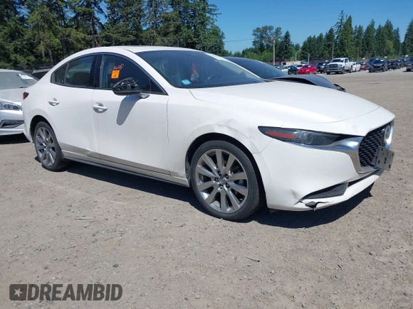 2021 Mazda 3 with VIN JM1BPBDL6M1340029, listed as a IAAI auction lot 42461850 with 79,798 mi miles and . Bid and sale history available at DreamBid. Image 1.