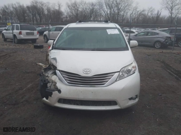 2015 Toyota Sienna XLE with VIN 5TDYK3DC8FS537028, listed as a IAAI auction lot 41192117 with 198,243 mi miles. Bid and sale history available at carsss.com. Image 12.