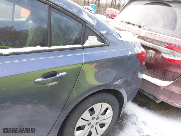 2014 Chevrolet Cruze LS with VIN 1G1PB5SG7E7142059, listed as a IAAI auction lot 41435050 with 106,067 mi miles. Bid and sale history available at carsss.com. Image 17.