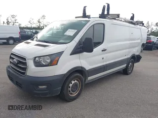 2020 Ford Transit Cargo with VIN 1FTBR1Y8XLKA19646, listed as a IAAI auction lot 42633323 with 82,577 mi miles and . Bid and sale history available at DreamBid. Image 17.