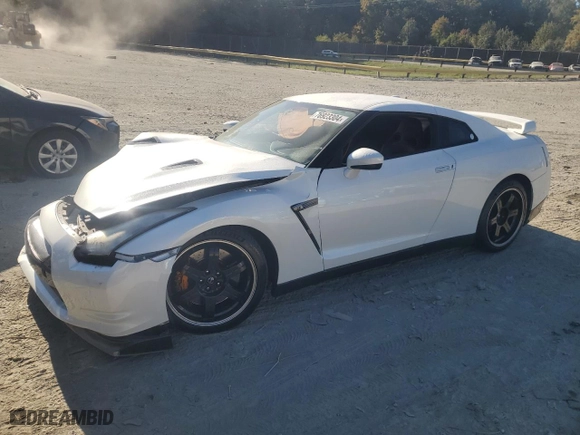 2010 Nissan GT-R Premium with VIN JN1AR5EF4AM231033, listed as a Copart auction lot 76923304 with 85706 miles and Salvage Title. Bid and sale history available at carsss.com. Image 1.