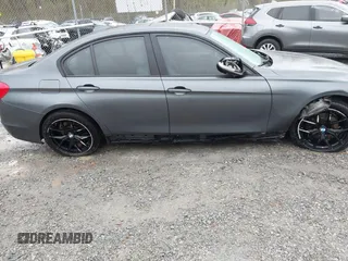 2013 BMW 3 Series 328i xDrive with VIN WBA3B3C56DF542509, listed as a IAAI auction lot 42010587 with 187,082 mi miles. Bid and sale history available at carsss.com. Image 6.