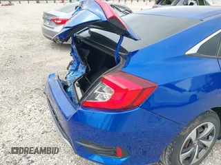 2020 Honda Civic LX with VIN 2HGFC2F69LH550744, listed as a IAAI auction lot 42079594 with 34,724 mi miles and . Bid and sale history available at DreamBid. Image 19.