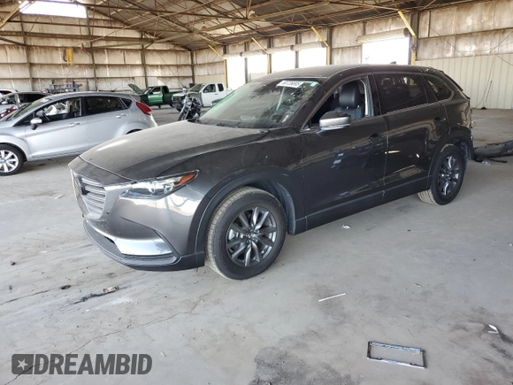 2021 Mazda CX-9 Touring z VIN JM3TCACYXM0520912, wystawiony jako Copart lot #60726695 z przebiegiem 36 506 mil mil oraz Szkoda całkowita • Salvage title. Historia ofert i sprzedaży dostępna na DreamBid. Obrazek 1.