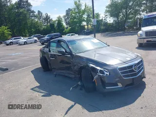 2014 Cadillac CTS Luxury AWD z VIN 1G6AX5SX7E0173466, wystawiony jako IAAI lot #42187266 z przebiegiem 115 140 mil mil oraz . Historia ofert i sprzedaży dostępna na DreamBid. Obrazek 6.