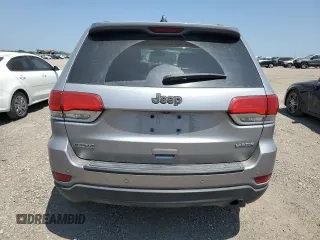 2017 Jeep Grand Cherokee Laredo with VIN 1C4RJEAG0HC816410, listed as a Copart auction lot 52909905 with 102,326 mi miles and Salvage title. Bid and sale history available at DreamBid. Image 6.