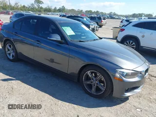 2013 BMW 3 Series 328i with VIN WBA3A5C50DF355734, listed as a IAAI auction lot 41629338 with 120,932 mi miles. Bid and sale history available at carsss.com. Image 1.