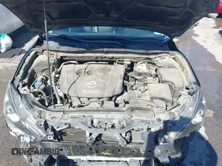 2014 Mazda 3 i Grand Touring z VIN JM1BM1M78E1159912, wystawiony jako IAAI lot #42079661 z przebiegiem 105 039 mil mil oraz . Historia ofert i sprzedaży dostępna na DreamBid. Obrazek 10.