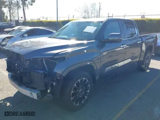 2023 Toyota Tundra 2WD Limited with VIN 5TFJA5AB3PX023188, listed as a IAAI auction lot 41669710 with 46,953 mi miles. Bid and sale history available at carsss.com. Image 2.