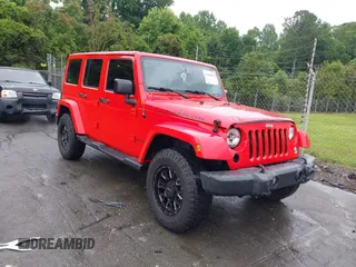 2015 Jeep Wrangler Unlimited Rubicon z VIN 1C4BJWFG6FL636250, wystawiony jako IAAI lot #42428104 z przebiegiem 138 617 mil mil oraz . Historia ofert i sprzedaży dostępna na DreamBid. Obrazek 1.