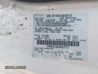 2006 Ford Freestar SE z VIN 2FMDA51666BA57711, wystawiony jako IAAI lot #39989040 z przebiegiem Nie podano mil oraz . Historia ofert i sprzedaży dostępna na DreamBid. Obrazek 9.
