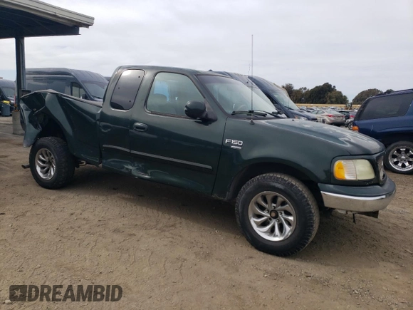 2003 Ford F-150 XL with VIN 1FTRX17L73KA47012, listed as a Copart auction lot 47410495 with 206,967 mi miles and Salvage title. Bid and sale history available at DreamBid. Image 4.