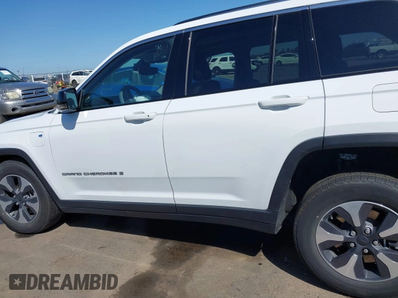 2022 Jeep Grand Cherokee with VIN 1C4RJYB66N8718018, listed as a IAAI auction lot 42002051 with Not provided miles and . Bid and sale history available at DreamBid. Image 13.