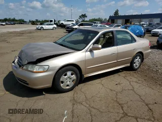 2002 Honda Accord EX z VIN 1HGCG16542A036578, wystawiony jako Copart lot #60443195 z przebiegiem 194 634 mil mil oraz Czysty tytuł • Clean title. Historia ofert i sprzedaży dostępna na DreamBid. Obrazek 1.