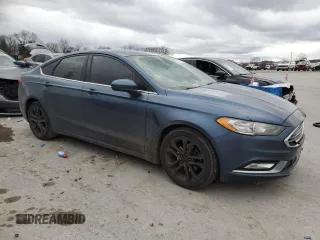 2018 Ford Fusion SE with VIN 3FA6P0HD9JR202257, listed as a Copart auction lot 87290204 with 190,280 mi miles and Salvage Title. Bid and sale history available at DreamBid. Image 4.