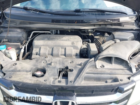 2014 Honda Odyssey Touring with VIN 5FNRL5H99EB111685, listed as a IAAI auction lot 42141227 with 183,484 mi miles and . Bid and sale history available at DreamBid. Image 10.