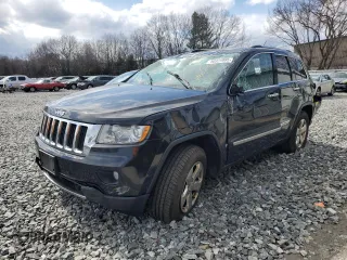 2013 Jeep Grand Cherokee Limited z VIN 1C4RJFBT8DC595571, wystawiony jako Copart lot #50325995 z przebiegiem 132 014 mil mil oraz Szkoda całkowita • Salvage title. Historia ofert i sprzedaży dostępna na DreamBid. Obrazek 1.