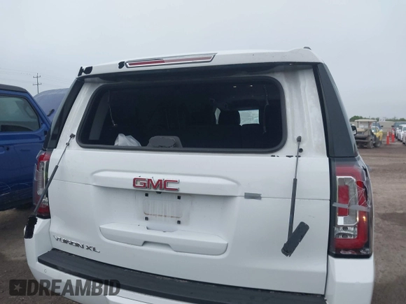 2019 GMC Yukon XL SLT z VIN 1GKS1GKC8KR395425, wystawiony jako IAAI lot #41910104 z przebiegiem 105 760 mil mil oraz . Historia ofert i sprzedaży dostępna na DreamBid. Obrazek 6.