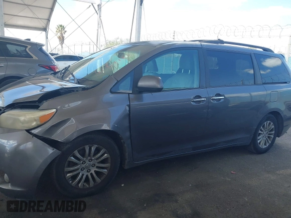 2011 Toyota Sienna XLE AAS with VIN 5TDYK3DC5BS146848, listed as a IAAI auction lot 41914140 with 259,862 mi miles. Bid and sale history available at carsss.com. Image 14.