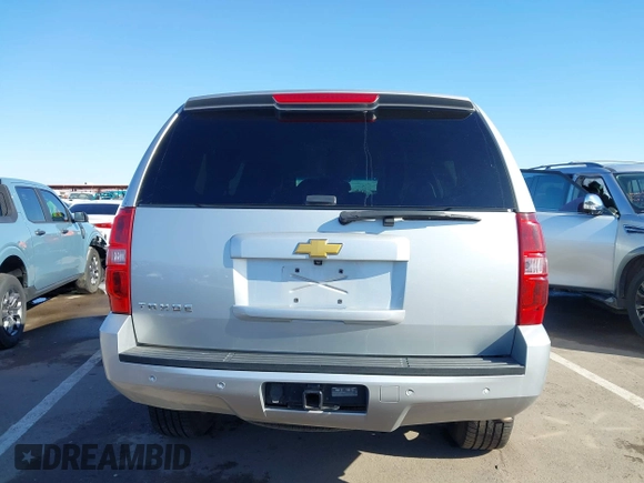 2013 Chevrolet Tahoe LT with VIN 1GNSKBE01DR157083, listed as a IAAI auction lot 41759189 with 153,403 mi miles and . Bid and sale history available at DreamBid. Image 17.