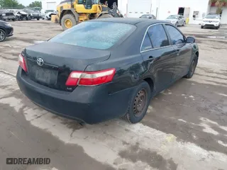 2007 Toyota Camry CE with VIN 4T1BE46K27U513940, listed as a IAAI auction lot 42108691 with 331,435 mi miles. Bid and sale history available at carsss.com. Image 4.