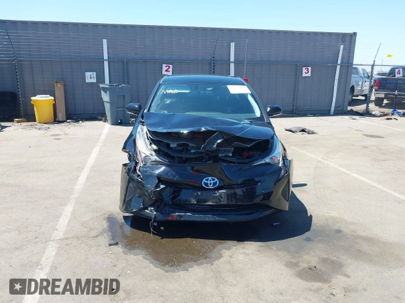 2016 Toyota Prius Four z VIN JTDKARFU7G3017018, wystawiony jako IAAI lot #42224376 z przebiegiem 74 136 mil mil oraz . Historia ofert i sprzedaży dostępna na DreamBid. Obrazek 6.