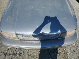 1994 Chevrolet Caprice z VIN 1G1BL52W4RR114969, wystawiony jako Copart lot #76950754 z przebiegiem Nie podano mil oraz Szkoda całkowita • Salvage title. Historia ofert i sprzedaży dostępna na DreamBid. Obrazek 11.