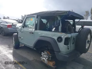 2023 Jeep Wrangler Willys z VIN 1C4HJXAG0PW600660, wystawiony jako IAAI lot #41713238 z przebiegiem 43 717 mil mil oraz . Historia ofert i sprzedaży dostępna na DreamBid. Obrazek 3.
