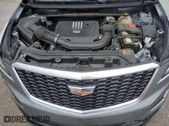 2023 Cadillac XT5 FWD Luxury z VIN 1GYKNAR47PZ144988, wystawiony jako Copart lot #50830365 z przebiegiem 17 687 mil mil oraz Szkoda całkowita • Salvage title. Historia ofert i sprzedaży dostępna na DreamBid. Obrazek 12.