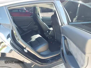 2019 Tesla Model 3 Mid Range with VIN 5YJ3E1EA2KF306286, listed as a IAAI auction lot 41699127 with 56,249 mi miles and . Bid and sale history available at DreamBid. Image 8.