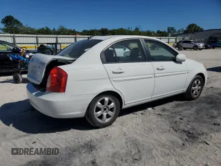 2006 Hyundai Accent GLS with VIN KMHCN46CX6U016680, listed as a Copart auction lot 48881085 with 49,262 mi miles and Salvage Title. Bid and sale history available at carsss.com. Image 3.