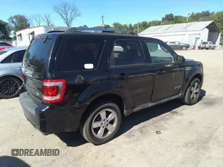 2010 Ford Escape Limited with VIN 1FMCU9EG5AKB06876, listed as a IAAI auction lot 40505932 with 143,259 mi miles and . Bid and sale history available at DreamBid. Image 4.
