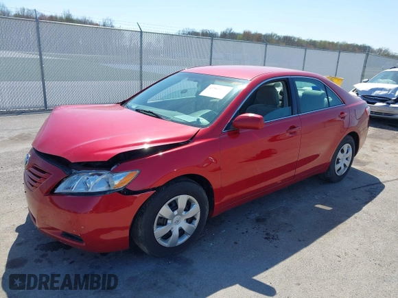 2007 Toyota Camry CE with VIN 4T1BE46K47U026559, listed as a IAAI auction lot 41969062 with 248,730 mi miles. Bid and sale history available at carsss.com. Image 2.