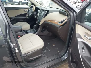 2016 Hyundai Santa Fe z VIN 5XYZU3LB0GG318165, wystawiony jako IAAI lot #42158474 z przebiegiem 74 420 mil mil oraz . Historia ofert i sprzedaży dostępna na DreamBid. Obrazek 5.