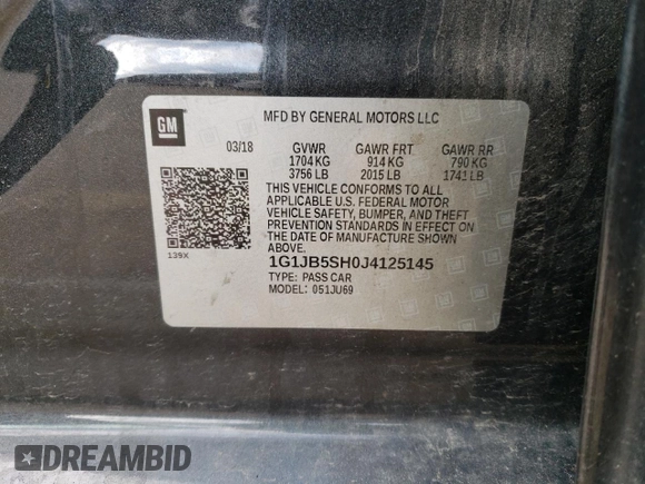 2018 Chevrolet Sonic LS with VIN 1G1JB5SH0J4125145, listed as a Copart auction lot 49402054 with 75,850 mi miles and Salvage title. Bid and sale history available at DreamBid. Image 14.